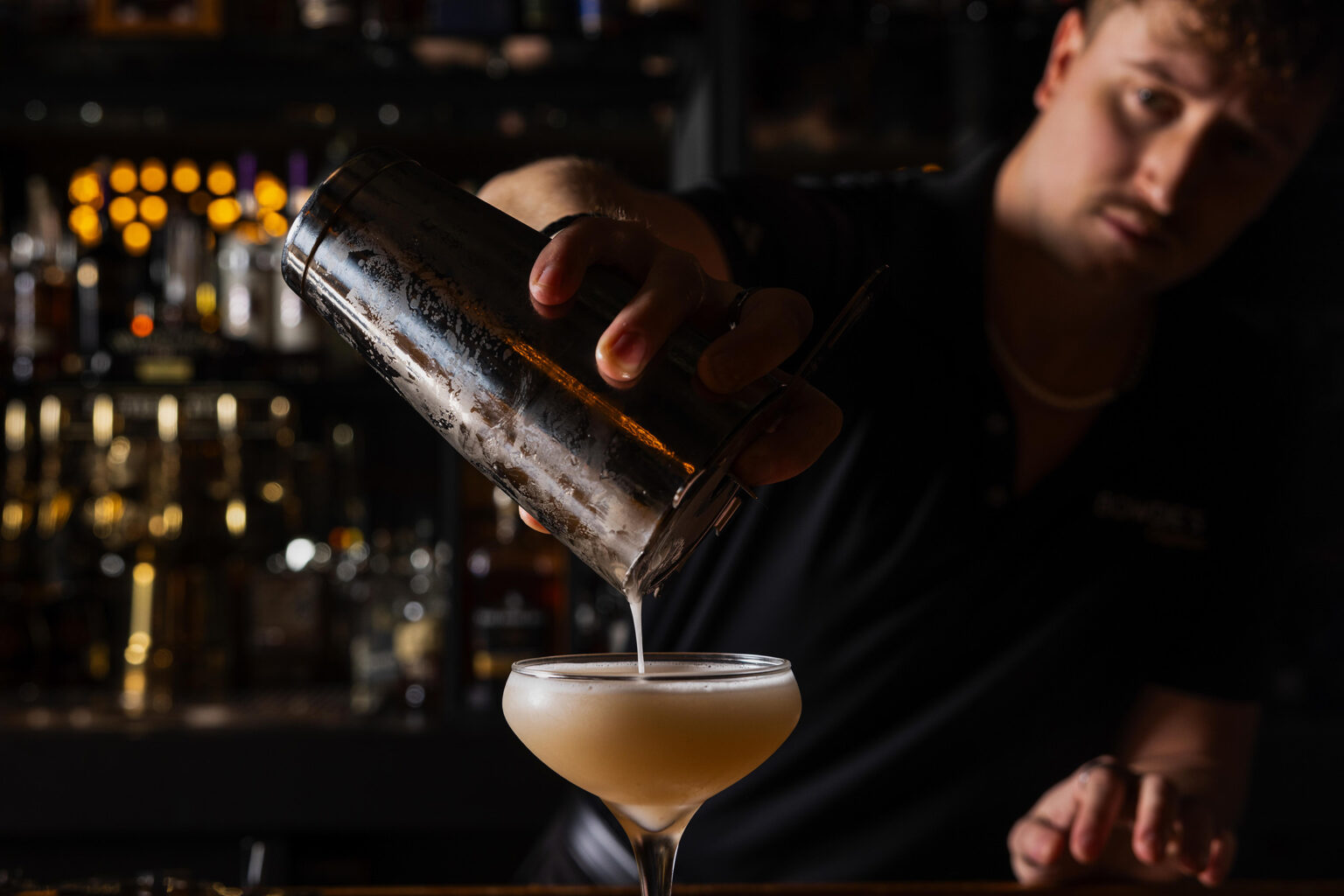 Bartender pouring a cocktail at Bowdie's Chophouse Hilton Head