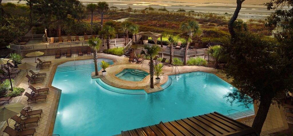 The luxurious pool at Omni Hilton Head Oceanfront Resort at twilight