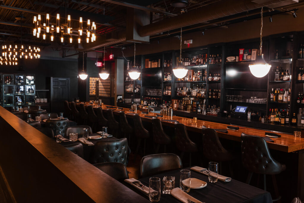 The bar and high-top tables at Bowdie's Chophouse in Hilton Head Island, South Carolina.