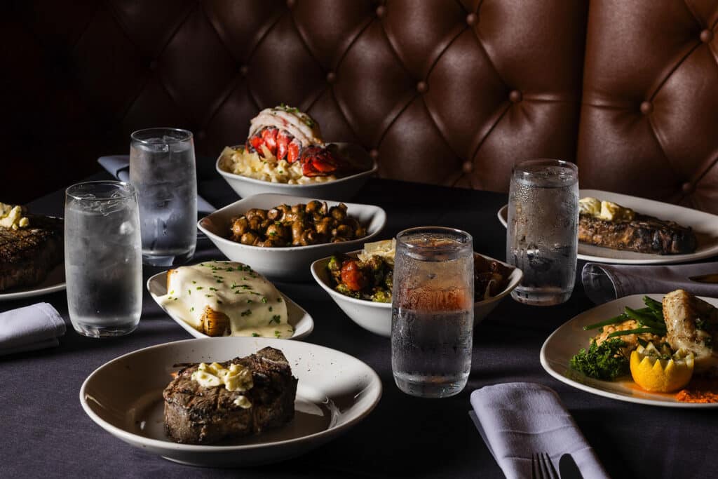 A table full of fan-favorite dishes at Bowdie's Chophouse in Hilton Head, SC.